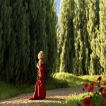 Woman in red dress walking down Cypress Lane