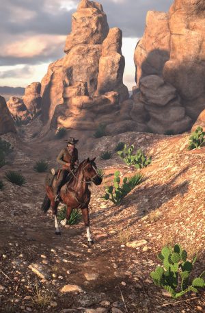 Cowboy and horse riding through desert